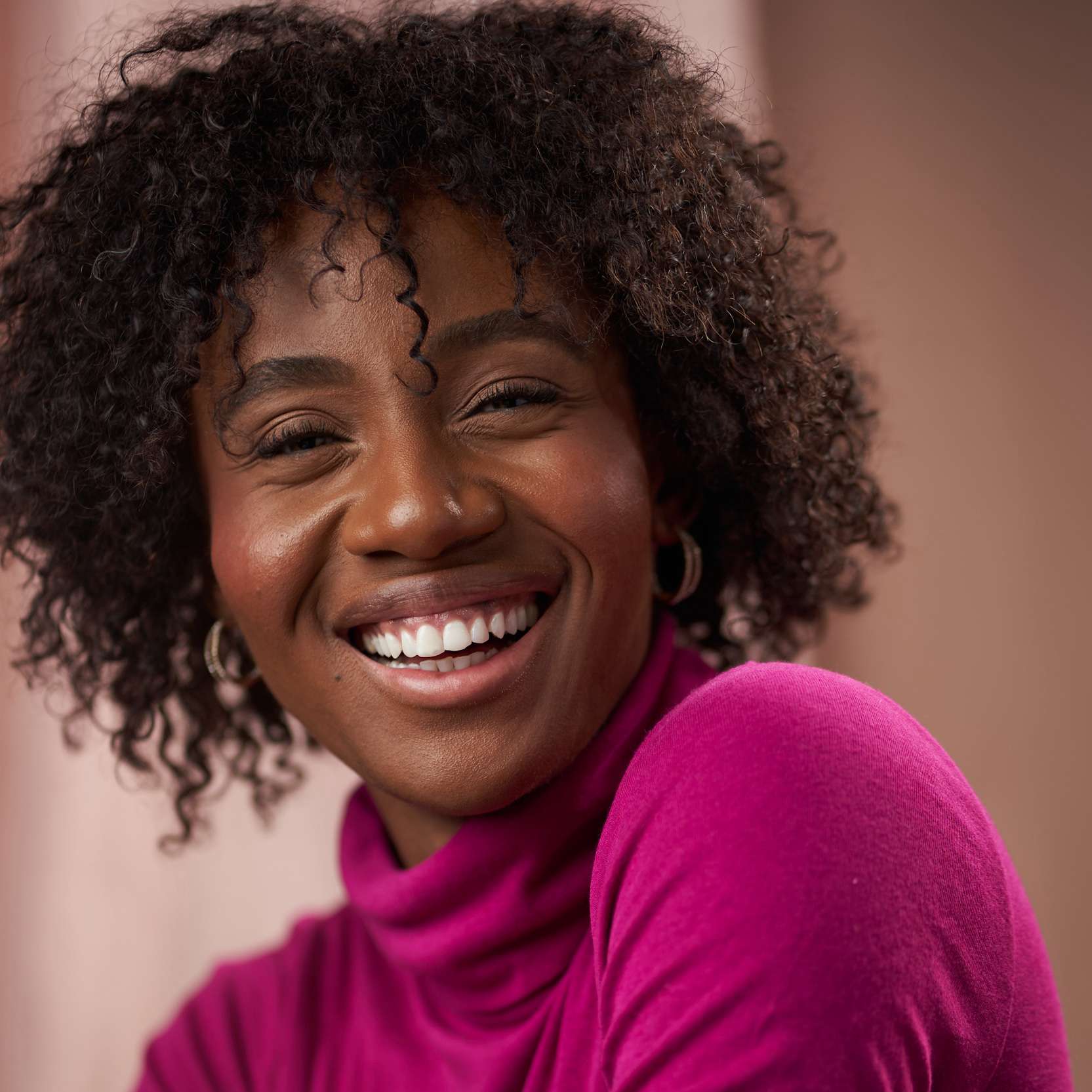 Natural lighting Professional Headshot for Black Model with pink colorful outfits