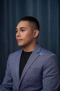 Asian male real estate agent portraiture magazine style monochromatic