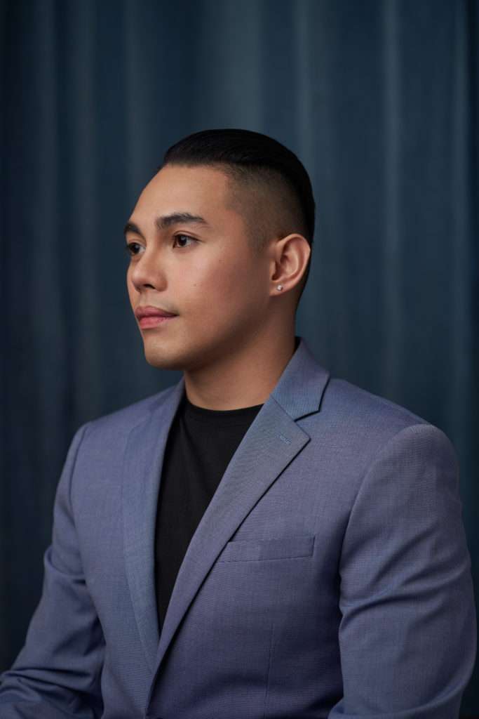 Asian male real estate agent portraiture magazine style monochromatic