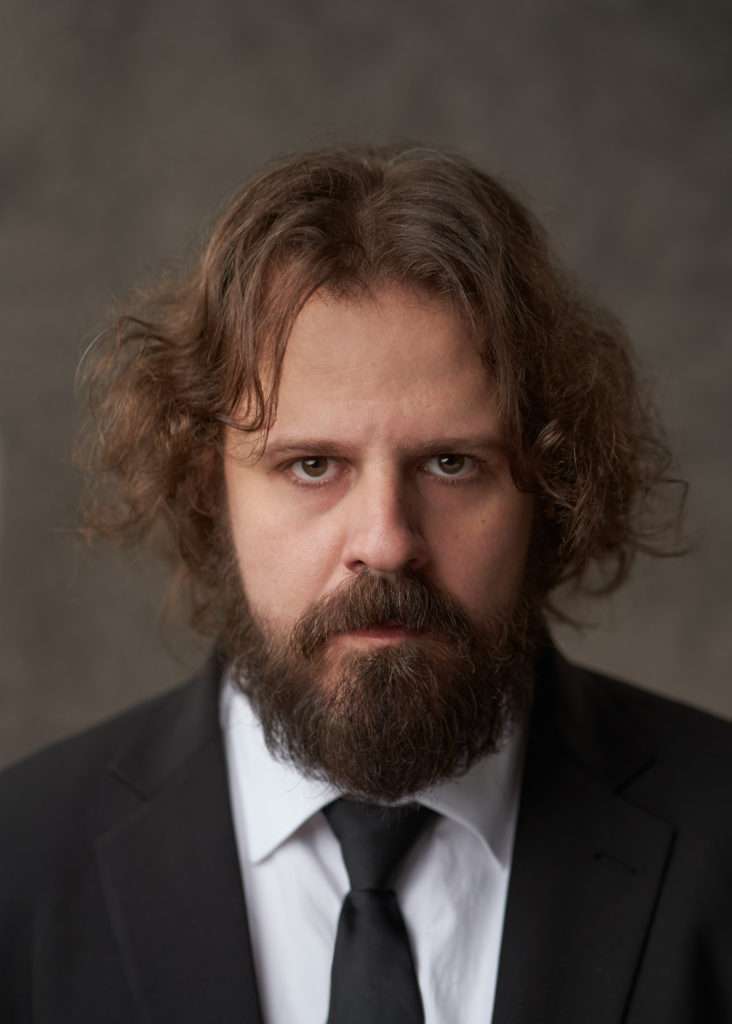 Caucasian brown hair stunt actor with beard and cinematic lighting